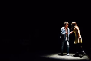 dramatic theater lighting on actors
