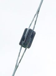 A strain insulator in a guy wire system
