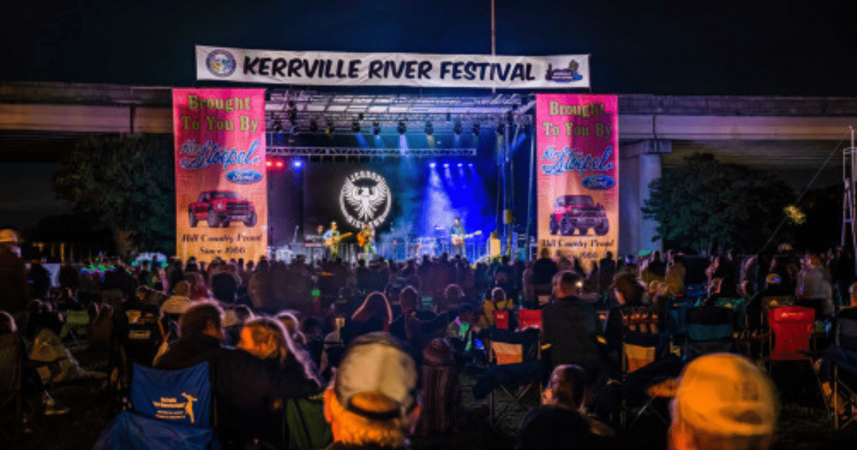 independent music festival stage and sponsorship banners