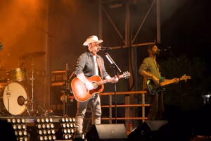 Musicians performing on stage at concert